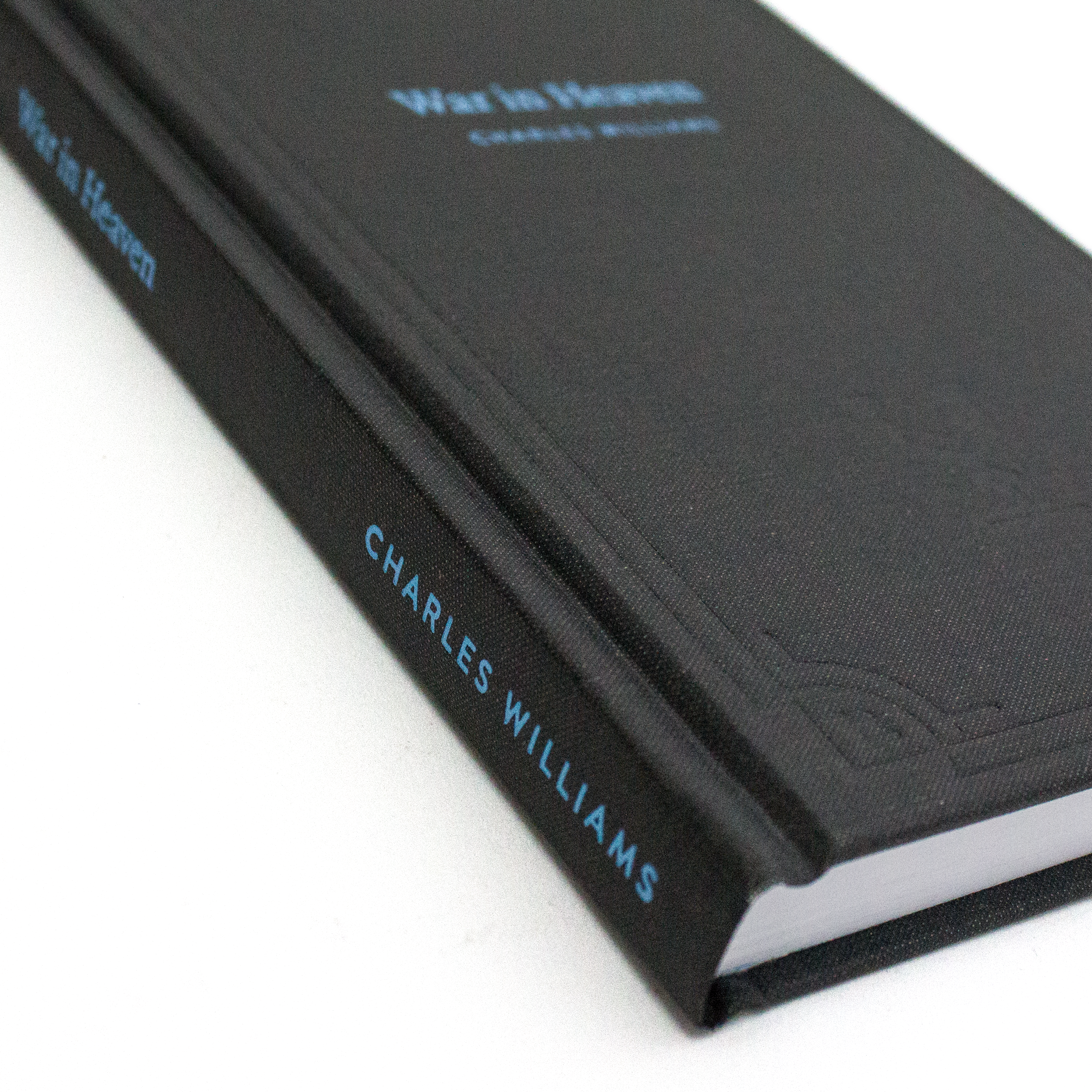 The covers are clothbound, with color foil and debossing